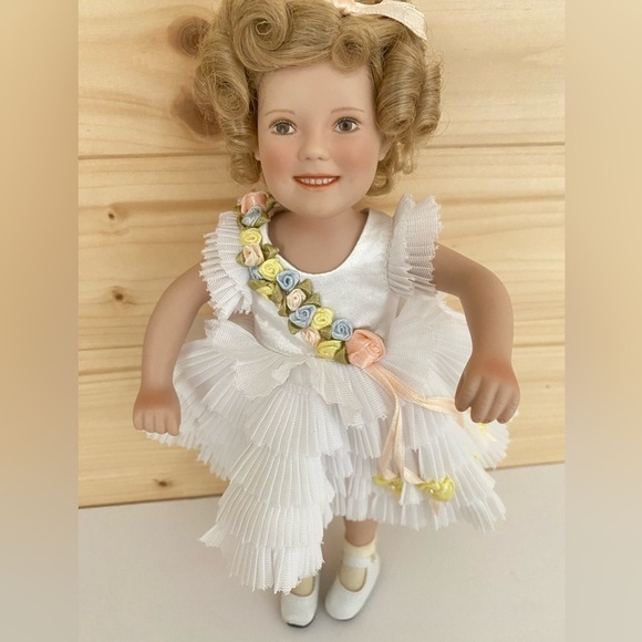 MBI Porcelain Shirley Temple 10” Doll “Baby Take a Bow” Ruffled White Dress - Picture 2 of 10